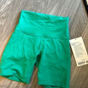 Hi selling wunder train HR short 6 inches, NWT size two, color is emerald green